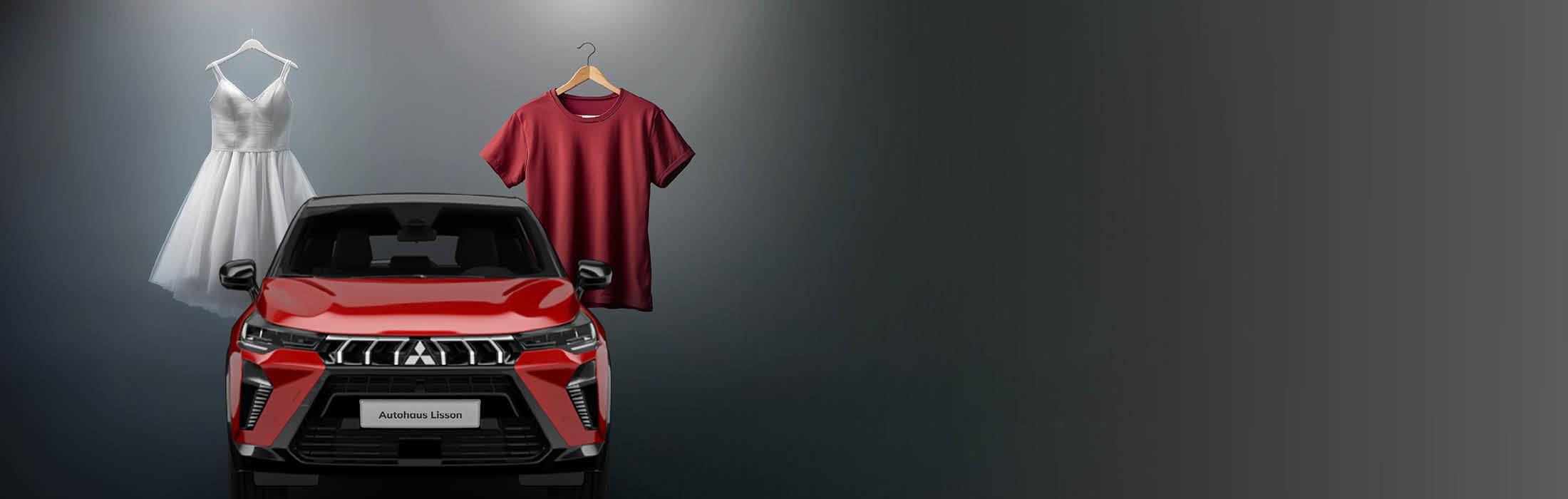 Vor einem roten Auto hängen ein weißes Kleid und ein rotes T-Shirt nebeneinander in der Luft.